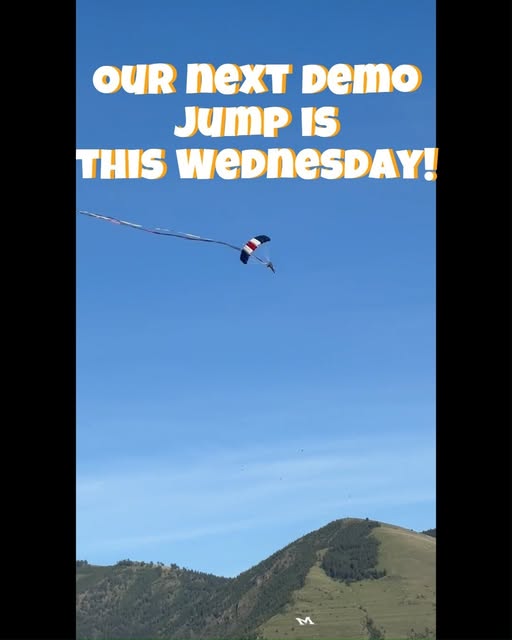 Canopy trailing a banner against a blue Montana sky above a mountain, announcing the next demo jump